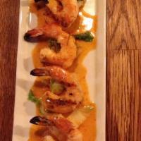 Chu Chee Jumbo Prawn · Grilled jumbo prawns in chu chee red curry sauce over steamed bokchoy, and napa cabbage. Ser...