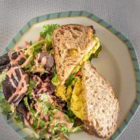 Curried Chicken Salad Sandwich · Farm fresh tomato, baby greens.