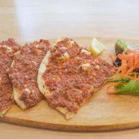 Lahmacun · 2 whole lahmacuns. Turkish pizza with ground beef and vegetables.