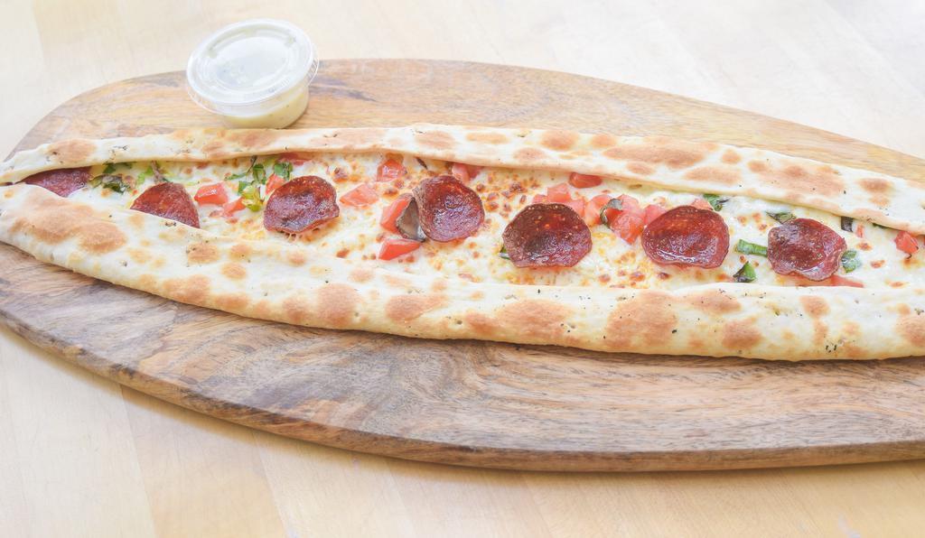 Pepperoni Pide · Flatbread with pepperoni.