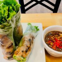 Fresh Spring Rolls Grilled Pork · (2 rolls) Grilled pork wrapped in rice paper with lettuce, rice noodle, cilantro, basil, cru...