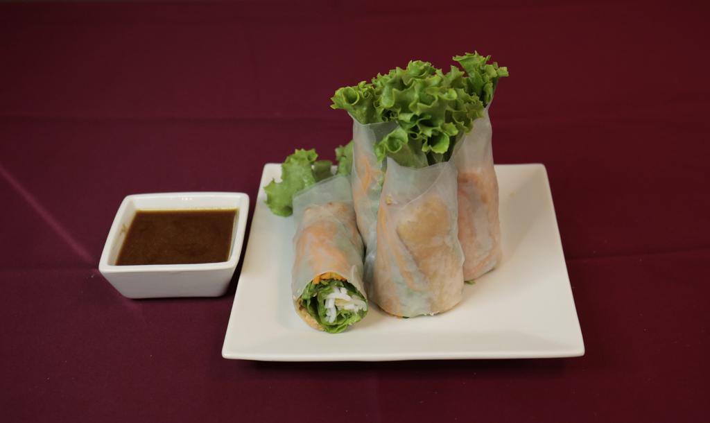 Fresh Spring Rolls – Salmon · 2 rolls, all fresh spring rolls are made with rice paper, carrot, cilantro, lettuce, noodles, mint, and basil.  Served with peanut sauce.