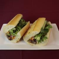 Grilled Beef · Banh mi served with mayonnaise, cilantro, pickle carrot, onion, jalapeno and cucumber.