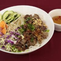 Beef · Served with onion, carrots, daikon, lettuce, mint, basil, cabbage, cilantro, cucumber, peanu...