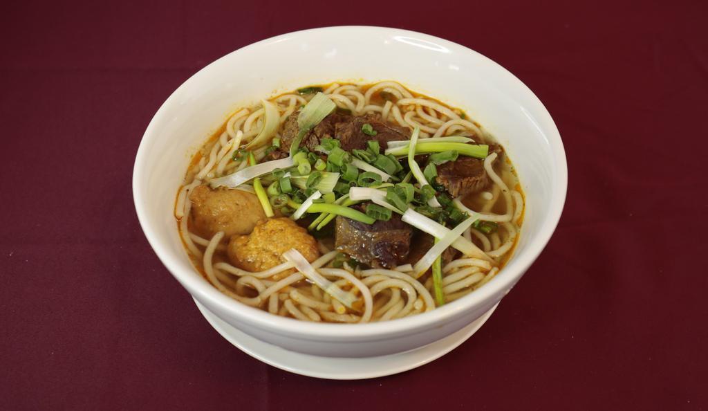 Spicy Beef Noodle Soup / Bun Bo Hue · Spicy. Marinated beef bone cooked for 12 hours. Served with cold thick rice noodles, beef, and ham. Broth includes flavors of ginger, lemongrass, pineapple, and spices. Comes with a mixed salad, basil, and mint on the side.