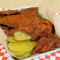 10 Chicken Tenders · Hand breaded chicken served original or Nashville hot style. Served with pickles and two dip...