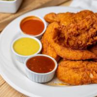 30 Chicken Tenders · Hand breaded chicken served original or Nashville hot style. Served with pickles and a 8 oz....