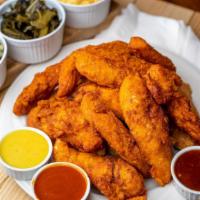 50 Chicken Tenders · Hand breaded chicken served original or Nashville hot style. Served with pickles two 8 oz. d...