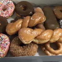Heavenly Dozen Donuts · 14 regular donuts.
Regular Donuts include
Cake donuts
Old fashioned donuts
Devils food donut...