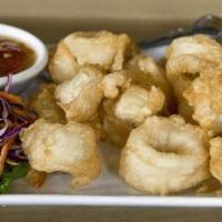 Thai Calamari · Lightly battered and deep fried. Served with a tangyhot Thai sauce.