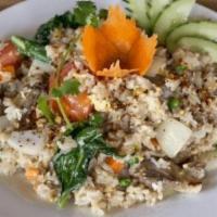 Khao Pad · (Thai Fried Rice) Wok-fried jasmine rice, onions, tomatoes, peas, carrots, Chinese broccoli,...