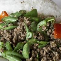 Pad Kra Prao · (Garlic Basil) Your choice of ground meat sautéed with Thai basil, green beans, bell peppers...