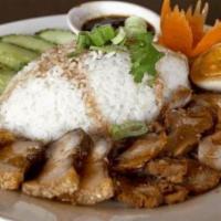Khao Moo Dang · (BBQ Pork & Crispy Pork)  Sliced marinated BBQ pork and crispy pork over rice with Thai BBQ ...