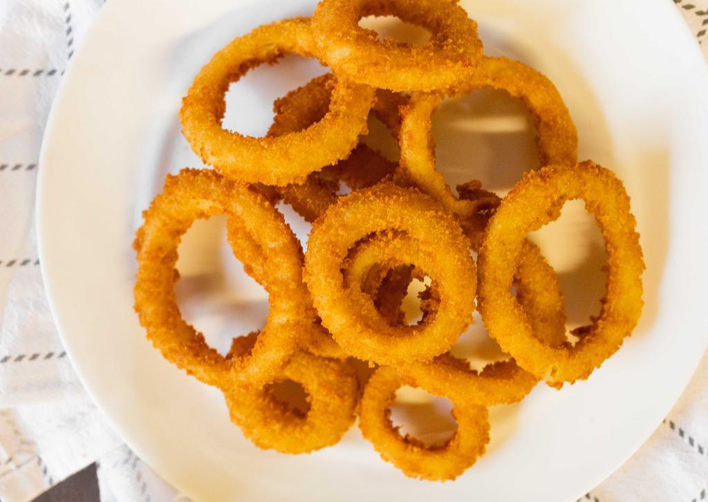 Large Onion Ring · Put a ring on it with our gourmet, lightly breaded onion rings.
