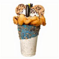 Dirty Cookie · Frosting covered cup dipped in oreos and chocolate chip cookies, vanilla ice cream with dirt...