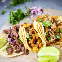 Street Tacos · Comes with your choice of meat