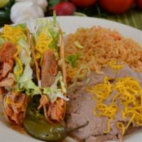 #16. 2 Chicken Tacos · 2 Hard shell tortilla tacos, Lettuce and Cheese. Combo comes with Rice and Beans
