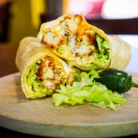New! Spicy Fried Chicken Burrito · Spicy Fried Chicken Tenders, Queso, Chipotle Sauce, Sour Cream, and Lettuce