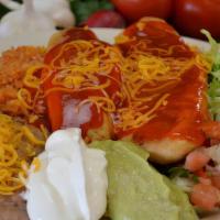 #13. 2 Chile Rellenos · Chile Rellenos, Pico, Cheese, Sour Cream, lettuce & Enchilada Sauce. Rice, Beans and Cheese ...
