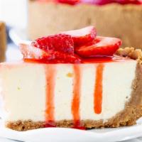 Strawberry Cheesecake  · Original Cheesecake with fresh strawberry topped with house made strawberry  coulis sauce.
