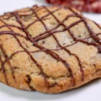 Giant Chocolate Chip Cookie · Mochidon's signature always made fresh, light, chewy giant chocolate chip cookie.