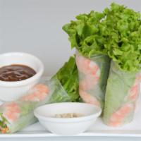 Goi Cuon Tom · Shrimp rolls (two). Salad roll with fresh noodles, herbs, and shrimp. Served with peanut sau...
