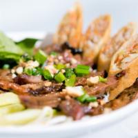 Bun Cha Gio Thit Heo Nuong · Grilled pork, egg rolls.