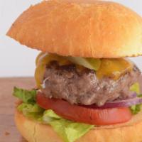 Cheeseburger Slider · Kobe beef or chicken slider on brioche bun. Cheddar, lettuce, tomato, caramelized onion, pic...