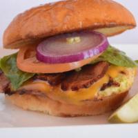 All American Chicken Burger · All natural, 6 oz. chicken breast (fresh, not frozen) on a brioche bun. Applewood smoked bac...
