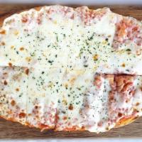 Classic Cheese Flatbread · Mozzarella on red sauce.