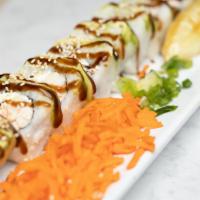 Guamuchilito Roll · Filled with seaweed, cucumber, avocado, cream cheese, and crab. Outside, shrimp. Crab salad,...