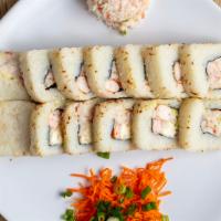California Roll · Filled with seaweed, cucumber, avocado, cream cheese, shrimp and crab salad. Outside sesame ...