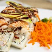 Guamuchilito Roll · Filled with seaweed, cucumber, avocado, cream cheese and crab. Outside, shrimp, crab salad, ...