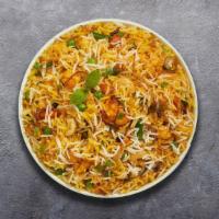 Vibrant Veggie Biryani	 · Spiced seasoned vegetables cooked with Indian spices and basmati rice. Served with house rai...
