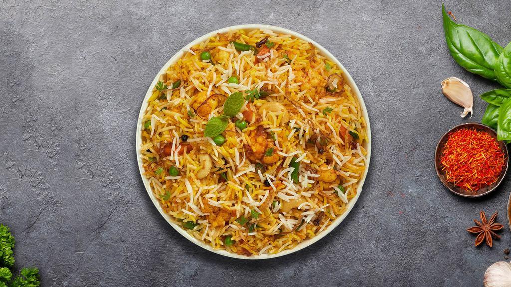 Vibrant Veggie Biryani	 · Spiced seasoned vegetables cooked with Indian spices and basmati rice. Served with house raita.