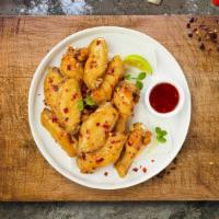 Sweet Chili O' Mine Wings · Fresh chicken wings breaded, fried until golden brown, and tossed in sweet chili sauce. Serv...