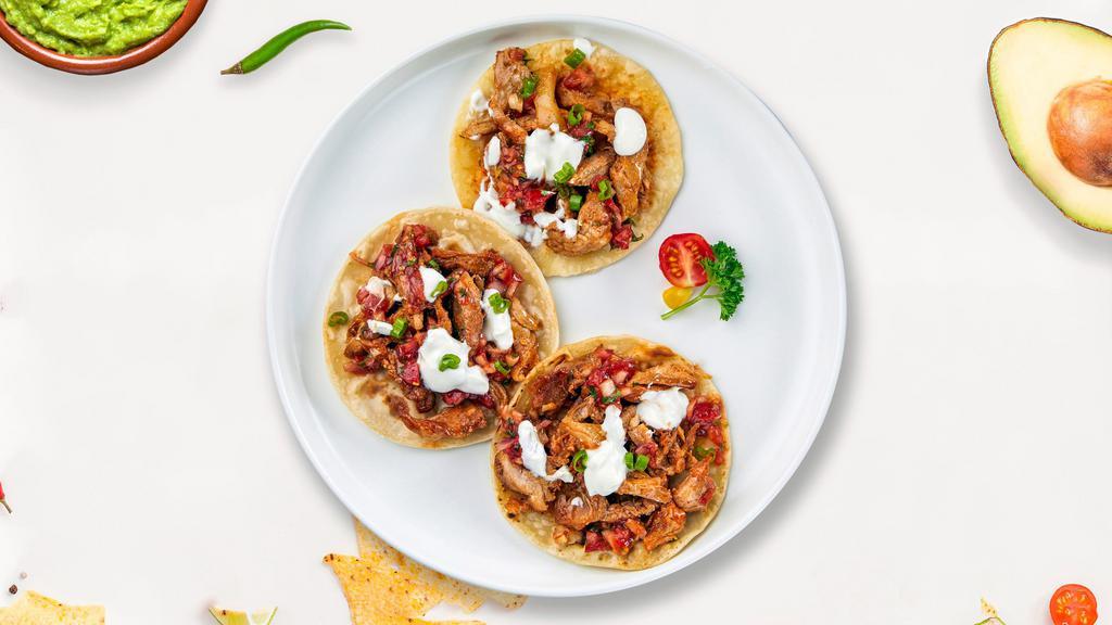 All About Al Pastor Taco · Thinly sliced boneless shoulder pork topped with sour cream, salsa, chilies, and cilantro served on warm tortilla. Choice of one or three.
