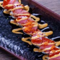 Play Boy Roll · Shrimp tempura, avocado topped w / tuna spicy mayo ,eel sauce & tobiko