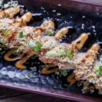 Golden  Dragon  Roll · Crab salad, avocado, shrimp tempura, topped with cooked shrimp, eel sauce, spicy mayo, crunc...