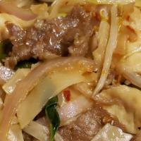 Drunken Noodles · Hot & spicy. Stir-fried wide rice noodles w/spicy chili sauce, basil leaves and bean sprouts...