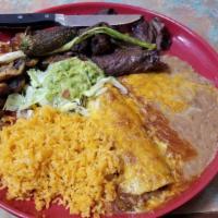 Ricardo'S Plate (8 Oz) · Steak, one enchilada - chicken, shredded or ground beef, and four prawns with mushrooms saut...