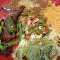 Carne Asada Con Ensalada De Nopales (8 Oz) · Steak served with a cactus salad, guacamole, green onion, and a deep-fried jalapeño. Served ...