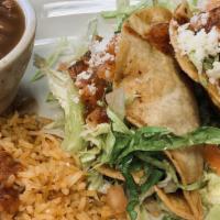 Combo #4 - Tacos Dorados (3) · Three corn deep-fried tacos to perfection filled with lettuce, tomatoes, and queso fresco. S...