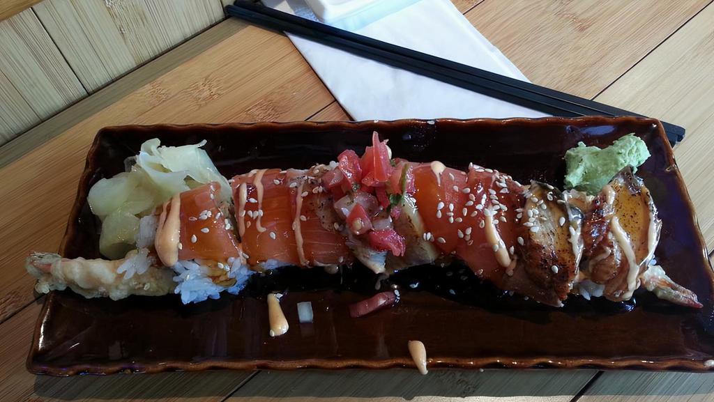 Seahawk · tempura shrimp, crab meat topped w/salmon, albacore, eel, avocado.