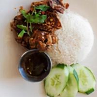 Tk Fried Chicken · Marinated fried chicken thigh served with chicken fat rice, fresh cucumber, and a side of bo...