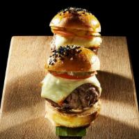 Lil' Brgs* · 2 wagyu beef lil' brgs* served on mini sesame seed burger buns, caramelized onions, American...