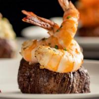Surf & Turf* · 6 oz beef filet cooked to the desired temperature & 2 grilled marinated jumbo shrimp. Choice...