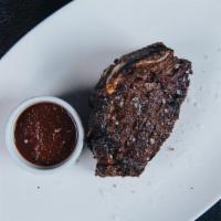 Bone-In Filet 14 Oz* · 14 oz bone-in beef filet cooked to the desired temperature & choice of STK sauce.
