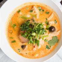 Tom Kha W/ Chicken · Similar to Tom Yum, but counter-balanced with coconut milk for a creamier version.