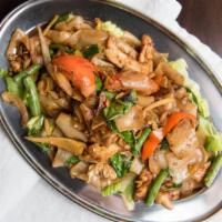 Pad Kea Mow · Wide rice noodles, stir-fried with egg, garlic, chili, bell peppers, onion, bamboo shoots, m...